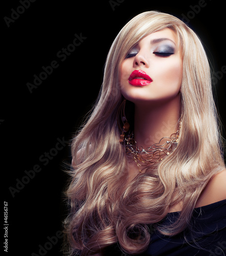 Photo: Beautiful Sexy Blond Girl. Blonde isolated on a Black Beautiful Sexy Blond Girl. Blonde isolated on a Black