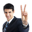 Businessman showing two fingers or victory sign