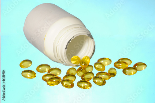 Photo: scattered fish oil pills scattered fish oil pills