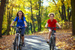Young people biking in city park