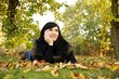 pretty woman lying on a meadow
