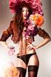 pretty gorgeous erotic woman in brown jacket and big flowers