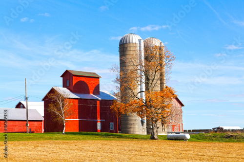 Photo: Traditional American Red Barn With Blue Sky Traditional American Red Barn With Blue Sky