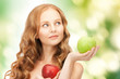 young beautiful woman with green and red apples