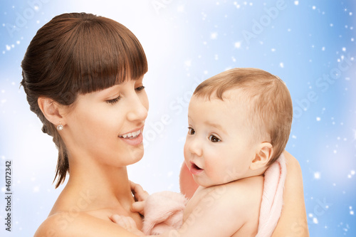 Photo: happy mother with adorable baby happy mother with adorable baby