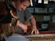 adult man working in a shoe factory