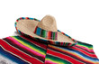 Serape and sombrero on a white background