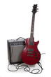 An electric guitar and amp on a white background with copy space