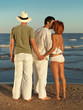 woman cheating on boyfriend by sea shore