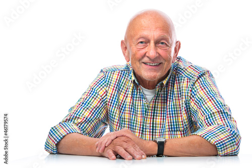 Photo: Portrait of a happy senior man smiling Portrait of a happy senior man smiling