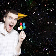 Excited Boy In Confetti Celebrating Birthday Party