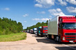 Trucks in a row. Highway Traffic Jam.