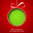 Abstract green Christmas ball cutted from paper on red backgroun