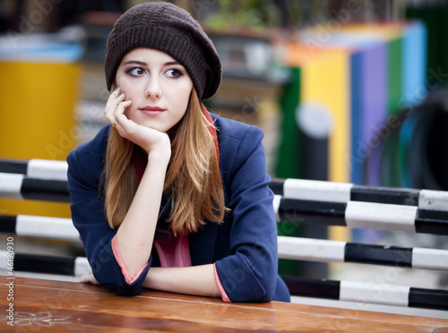 Photo: Beautiful girl at the cafe. Beautiful girl at the cafe.