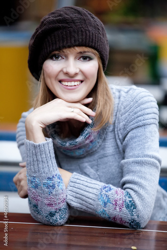 Photo: Beautiful girl at the cafe. Beautiful girl at the cafe.