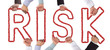 Hands holding letters forming RISK tag