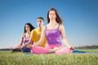 Foto: Group of young people have meditation on yoga class. Group of young people have meditation on yoga class.