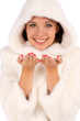 woman in a white coat with open hands palm for product