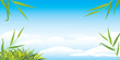 Branches and grass on the cloudy background