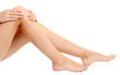 woman holding sore knee, isolated on white