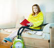  woman reposes from household chores