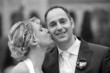bride is kissing her bridegroom