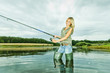 Photo: woman fishing in pond woman fishing in pond