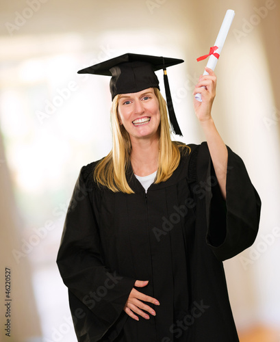 Photo: Happy Graduate Woman Holding Certificate Happy Graduate Woman Holding Certificate