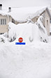Stop in the snow with blue signal