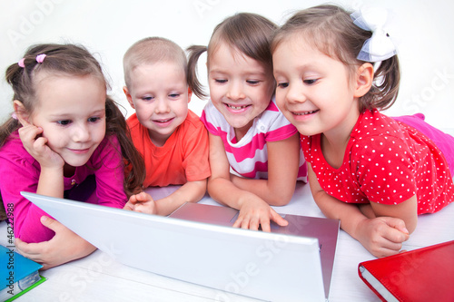 Photo: Children with laptop Children with laptop