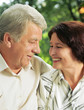 Senior happy couple embracing, outdoors
