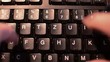 Close up of fast typing on keyboard
