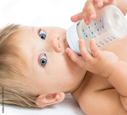 Photo: adorable baby drinking from bottle adorable baby drinking from bottle