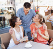Young friends having coffee break