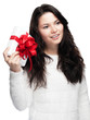 Young woman is looking forward to her gift - isolated