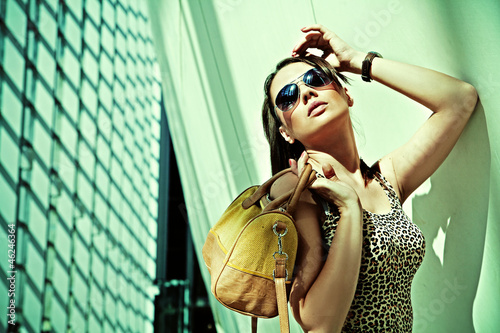 Photo: Attractive woman posing in modern building Attractive woman posing in modern building