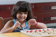 girl painting the martorana fruit