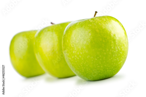 Photo: Green apples isolated on the white background Green apples isolated on the white background