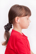 Little girl in a protective helmet