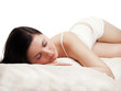 Pretty young woman sleeps alone on the side - isolated