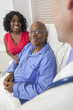 Senior African American Man Patient in Hospital Bed