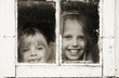 kids in grungy window