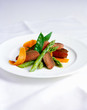 Lamb fillets and vegetables