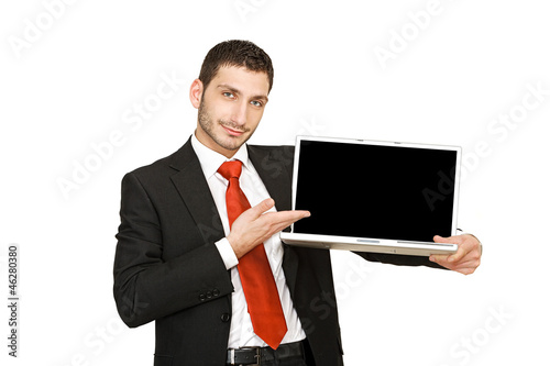 Photo: Junger Geschäftsmann hält Notebook Junger Geschäftsmann hält Notebook