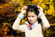 Photo: pretty asian woman in autumn pretty asian woman in autumn