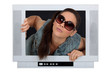 Woman coming out of a television screen