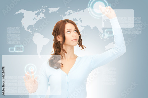Photo: businesswoman working with touch screen businesswoman working with touch screen