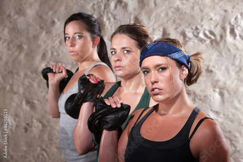 Photo: Ladies Lifting Weights in Boot Camp Workout Ladies Lifting Weights in Boot Camp Workout