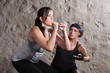 Lady and Trainer Sweating During Boot Camp Style Workout