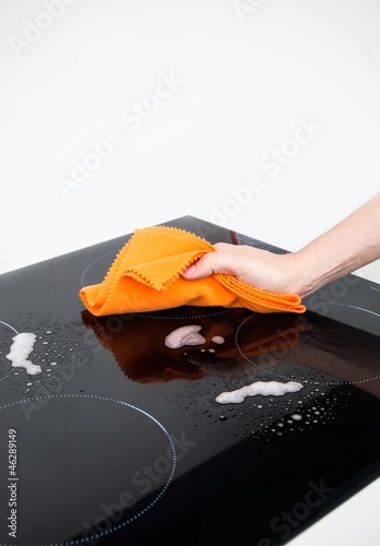 Photo: Hand cleaning induction stove Hand cleaning induction stove